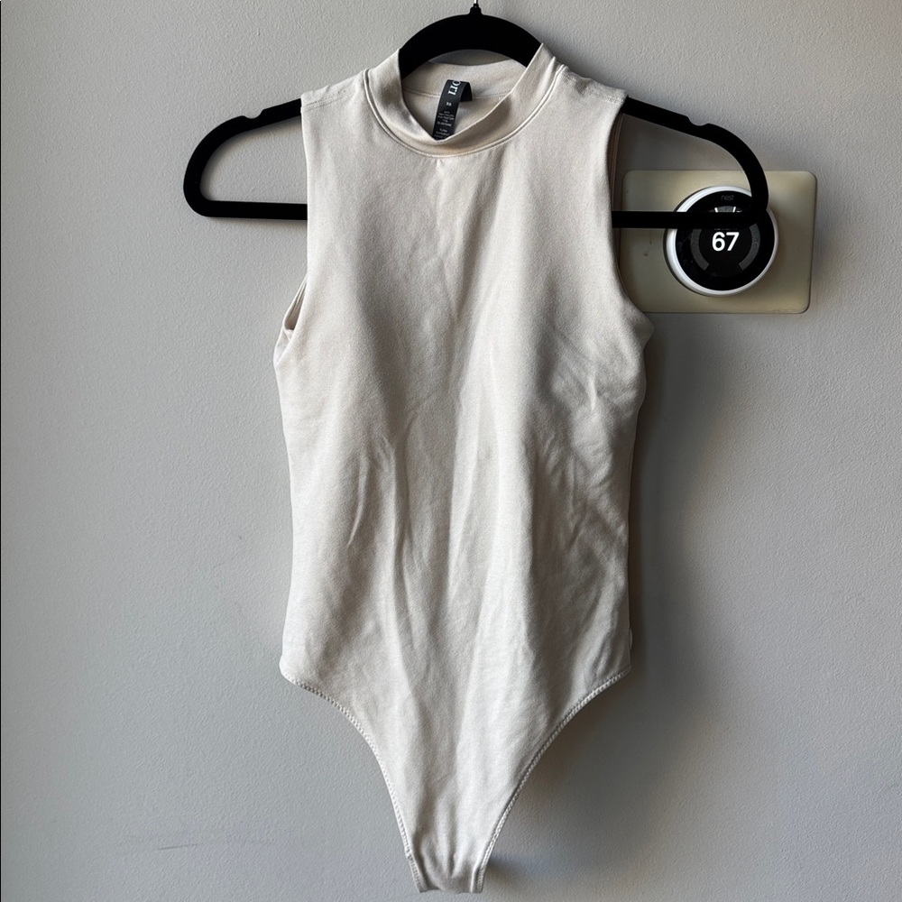 Vuori Halo Mockneck Sleeveless White Bodysuit